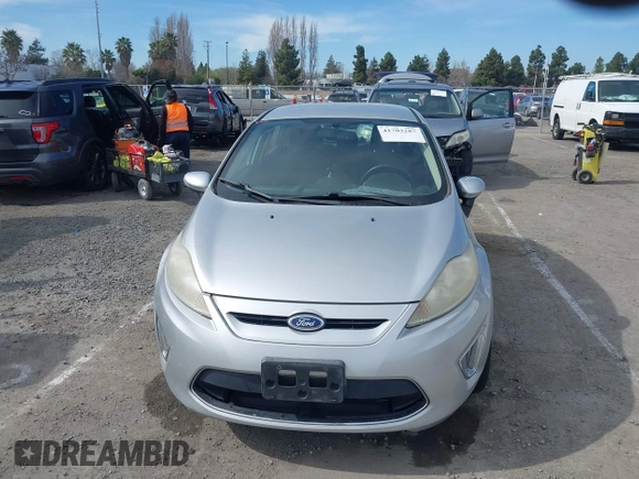 2011 Ford Fiesta SES with VIN 3FADP4FJ1BM102434, listed as a IAAI auction lot 41703287 with 124,476 mi miles. Bid and sale history available at carsss.com. Image 6.