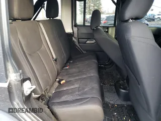 2018 Jeep Wrangler JK Unlimited Sport S with VIN 1C4BJWDG9JL882737, listed as a Copart auction lot 85765184 with 60,578 mi miles and Salvage Title. Bid and sale history available at carsss.com. Image 10.