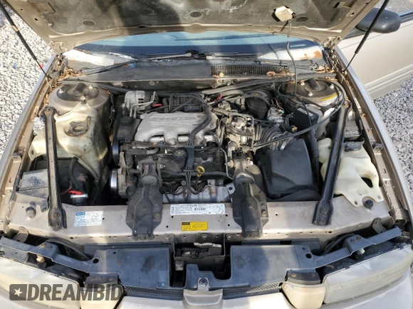 1997 Oldsmobile Cutlass Supreme S z VIN 1G3WH52M8VF352117, wystawiony jako Copart lot #41919094 z przebiegiem 155 523 mil mil oraz Szkody całkowita. Historia ofert i sprzedaży dostępna na DreamBid. Obrazek 11.