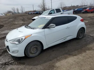 2013 Hyundai Veloster w/Black Int z VIN KMHTC6AD3DU153278, wystawiony jako Copart lot #47965705 z przebiegiem 172 375 mil mil oraz Szkoda całkowita • Salvage title. Historia ofert i sprzedaży dostępna na DreamBid. Obrazek 1.