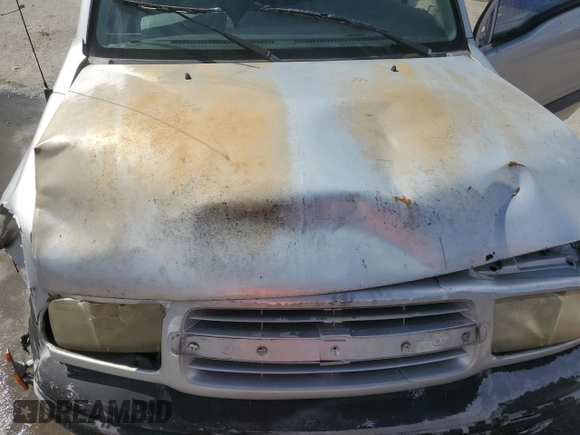 2003 Chevrolet Tracker with VIN 2CNBE13C836953178, listed as a Copart auction lot 60715605 with 128,978 mi miles and Salvage title. Bid and sale history available at DreamBid. Image 12.