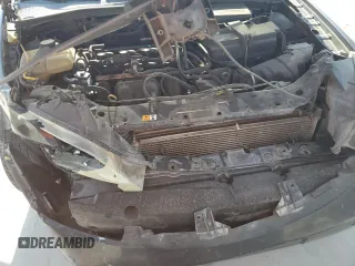 2006 Ford Focus S z VIN 1FAHP37N36W176473, wystawiony jako Copart lot #53781985 z przebiegiem 154 954 mil mil oraz Szkoda całkowita • Salvage title. Historia ofert i sprzedaży dostępna na DreamBid. Obrazek 11.