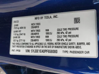 2023 Tesla Model 3 with VIN 5YJ3E1EA0PF658080, listed as a IAAI auction lot 42008846 with 32,301 mi miles and . Bid and sale history available at carsss.com. Image 9.