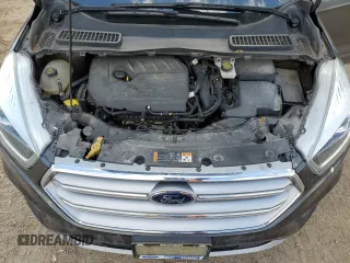 2017 Ford Escape SE z VIN 1FMCU0GD5HUA67154, wystawiony jako Copart lot #58474105 z przebiegiem 129 896 mil mil oraz Czysty tytuł • Clean title. Historia ofert i sprzedaży dostępna na DreamBid. Obrazek 12.