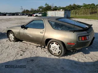 1984 Porsche 928 z VIN WP0JB0927ES862274, wystawiony jako Copart lot #75285934 z przebiegiem 97 509 mil mil oraz Tytuł czysty. Historia ofert i sprzedaży dostępna na DreamBid. Obrazek 2.