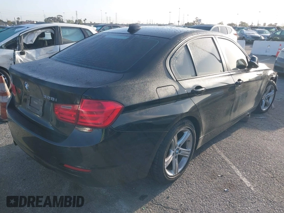 2015 BMW 3 Series 328i with VIN WBA3C1C55FK119562, listed as a IAAI auction lot 41945606 with 51,922 mi miles and . Bid and sale history available at DreamBid. Image 4.