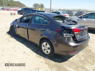 2018 Kia Forte LX with VIN 3KPFL4A71JE201144, listed as a IAAI auction lot 41874778 with 100,980 mi miles. Bid and sale history available at carsss.com. Image 3.