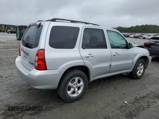 2006 Mazda Tribute i with VIN 4F2YZ02Z26KM14821, listed as a Copart auction lot 71718434 with 318,841 mi miles and Salvage Title. Bid and sale history available at carsss.com. Image 3.