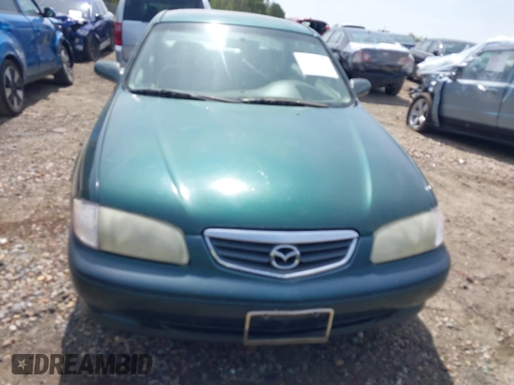 2001 Mazda 626 LX z VIN 1YVGF22D915241384, wystawiony jako IAAI lot #41927705 z przebiegiem 231 801 mil mil oraz . Historia ofert i sprzedaży dostępna na DreamBid. Obrazek 6.