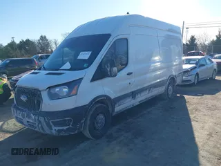 2021 Ford Transit Cargo with VIN 1FTBW3X82MKA14027, listed as a IAAI auction lot 41423524 with 121,221 mi miles. Bid and sale history available at carsss.com. Image 17.