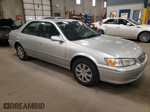 2000 Toyota Camry CE z VIN JT2BG22K1Y0483646, wystawiony jako Copart lot #53129705 z przebiegiem 187 418 mil mil oraz Szkoda całkowita • Salvage title. Historia ofert i sprzedaży dostępna na DreamBid. Obrazek 4.