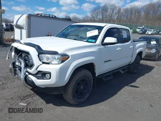 2020 Toyota Tacoma SR5 with VIN 3TMCZ5AN5LM339977, listed as a IAAI auction lot 41886937 with 94,986 mi miles and . Bid and sale history available at DreamBid. Image 17.