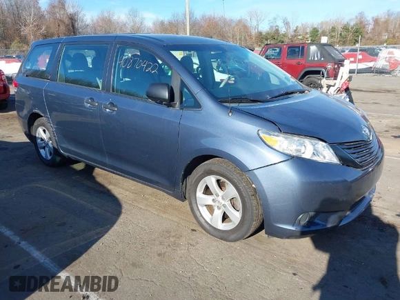 2014 Toyota Sienna L with VIN 5TDZK3DC0ES413970, listed as a IAAI auction lot 40870422 with 138,589 mi miles. Bid and sale history available at carsss.com. Image 1.