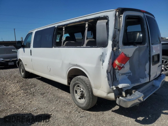 2005 Chevrolet Express Passenger with VIN 1GAHG39U051232615, listed as a Copart auction lot 73574264 with 207,303 mi miles and Salvage title. Bid and sale history available at DreamBid. Image 2.