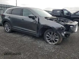 2023 Mazda CX-9 Touring with VIN JM3TCBCY4P0654597, listed as a Copart auction lot 55920855 with 58,534 mi miles and Salvage title. Bid and sale history available at DreamBid. Image 4.