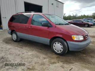 2000 Toyota Sienna LE with VIN 4T3ZF13C3YU284605, listed as a Copart auction lot 79405404 with 137,213 mi miles and Salvage Title. Bid and sale history available at carsss.com. Image 4.