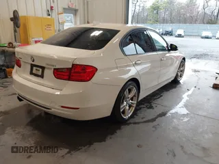 2014 BMW 3 Series 328i xDrive with VIN WBA3B5C53EP543964, listed as a IAAI auction lot 41856923 with 149,440 mi miles. Bid and sale history available at carsss.com. Image 4.