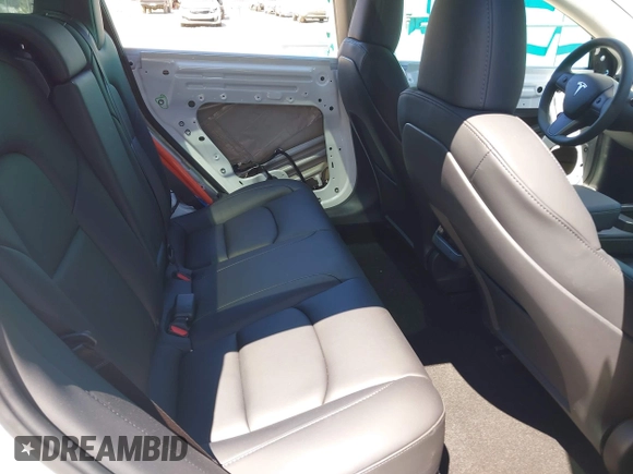 2023 Tesla Model 3 z VIN 5YJ3E1EA7PF611306, wystawiony jako IAAI lot #42826820 z przebiegiem 24 422 mil mil oraz . Historia ofert i sprzedaży dostępna na DreamBid. Obrazek 8.