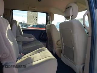 2014 Dodge Grand Caravan SXT with VIN 2C4RDGCG0ER210186, listed as a IAAI auction lot 40813319 with 100,230 mi miles and . Bid and sale history available at DreamBid. Image 8.