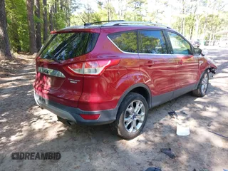 2014 Ford Escape Titanium with VIN 1FMCU9JX7EUB68165, listed as a IAAI auction lot 42141235 with 172,041 mi miles and . Bid and sale history available at DreamBid. Image 4.