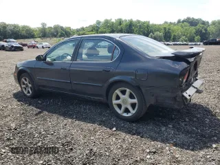 2001 Nissan Maxima SE with VIN JN1CA31D51T826665, listed as a Copart auction lot 63683545 with 95,931 mi miles and Salvage title. Bid and sale history available at DreamBid. Image 2.