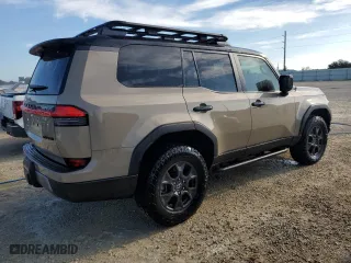 2024 Lexus GX with VIN JTJTBCDX2R5015693, listed as a Copart auction lot 73842274 with 803 mi miles and Salvage Title. Bid and sale history available at carsss.com. Image 3.