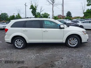 2017 Dodge Journey SXT with VIN 3C4PDDBG2HT702775, listed as a IAAI auction lot 42596303 with 130,639 mi miles and . Bid and sale history available at DreamBid. Image 14.
