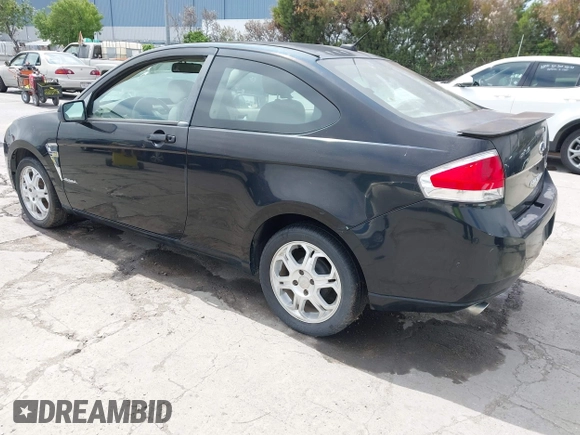 2008 Ford Focus SE with VIN 1FAHP33N38W107114, listed as a IAAI auction lot 42076432 with 124,487 mi miles. Bid and sale history available at carsss.com. Image 3.