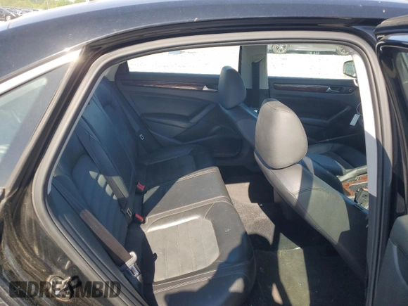 2013 Volkswagen Passat SEL Premium z VIN 1VWCN7A38DC030199, wystawiony jako Copart lot #53314795 z przebiegiem 125 617 mil mil oraz Szkoda całkowita • Salvage title. Historia ofert i sprzedaży dostępna na DreamBid. Obrazek 10.