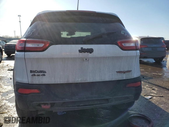2015 Jeep Cherokee Trailhawk with VIN 1C4PJMBB5FW778883, listed as a Copart auction lot 44444555 with 113,194 mi miles and Salvage title. Bid and sale history available at DreamBid. Image 6.