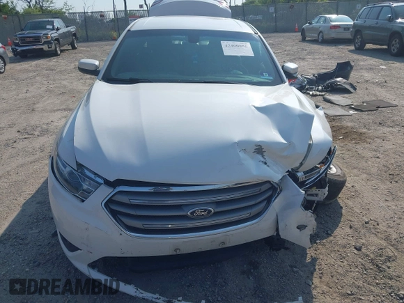 2015 Ford Taurus SEL with VIN 1FAHP2E97FG149657, listed as a IAAI auction lot 42400856 with 138,386 mi miles and . Bid and sale history available at DreamBid. Image 12.