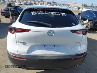 2024 Mazda CX-30 S Premium with VIN 3MVDMBDM4RM616159, listed as a IAAI auction lot 42328334 with 4,614 mi miles and . Bid and sale history available at DreamBid. Image 16.