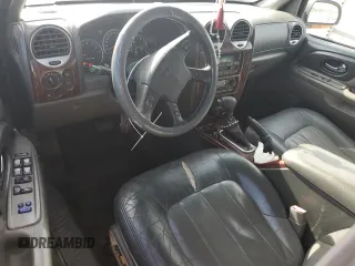 2004 GMC Envoy SLE with VIN 1GKES16P746127734, listed as a Copart auction lot 70487474 with 462,491 mi miles and Salvage Title. Bid and sale history available at DreamBid. Image 8.