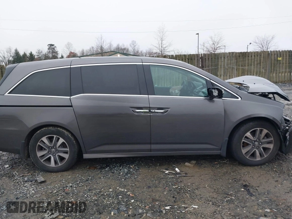 2015 Honda Odyssey Touring Elite with VIN 5FNRL5H92FB089627, listed as a IAAI auction lot 41115013 with Not Provided miles and . Bid and sale history available at DreamBid. Image 13.