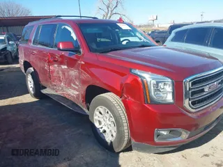 2019 GMC Yukon SLT with VIN 1GKS2BKC8KR158630, listed as a IAAI auction lot 41380190 with 131,786 mi miles. Bid and sale history available at carsss.com. Image 1.