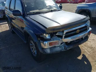 1997 Toyota 4Runner Limited with VIN JT3GN87R1V0048198, listed as a IAAI auction lot 41826521 with 253,294 mi miles. Bid and sale history available at carsss.com. Image 6.