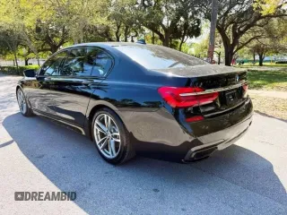 2019 BMW 7 Series 740i z VIN WBA7E2C59KB218XXX, wystawiony jako Copart lot #48633165 z przebiegiem 79 444 mil mil oraz Czysty tytuł • Clean title. Historia ofert i sprzedaży dostępna na DreamBid. Obrazek 3.