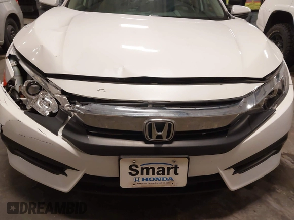 2018 Honda Civic EX with VIN 19XFC2F74JE005647, listed as a IAAI auction lot 41938607 with 90,263 mi miles and . Bid and sale history available at DreamBid. Image 6.