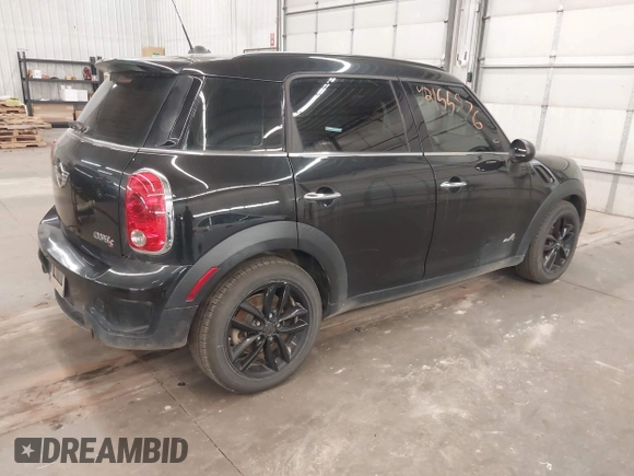 2012 MINI Countryman S z VIN WMWZC5C57CWL55975, wystawiony jako IAAI lot #42155876 z przebiegiem 126 637 mil mil oraz . Historia ofert i sprzedaży dostępna na DreamBid. Obrazek 4.