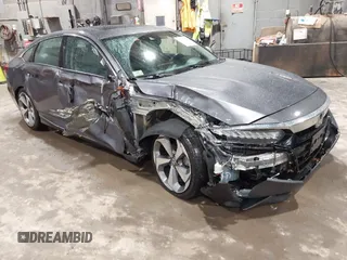 2019 Honda Accord Touring with VIN 1HGCV2F99KA031634, listed as a IAAI auction lot 41209019 with 74,965 mi miles and . Bid and sale history available at DreamBid. Image 6.