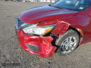 2016 Nissan Altima 2.5 SL with VIN 1N4AL3APXGC209656, listed as a IAAI auction lot 41017105 with 145,040 mi miles. Bid and sale history available at carsss.com. Image 6.