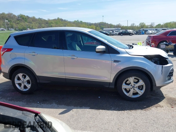 2016 Ford Escape SE with VIN 1FMCU9G98GUA10333, listed as a IAAI auction lot 42021490 with 128,973 mi miles. Bid and sale history available at carsss.com. Image 14.