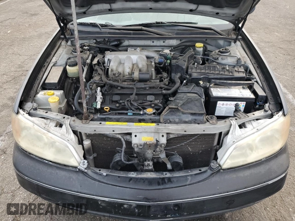 2004 Infiniti I35 z VIN JNKDA31A54T212810, wystawiony jako Copart lot #72467654 z przebiegiem 137 809 mil mil oraz Szkoda całkowita • Salvage title. Historia ofert i sprzedaży dostępna na DreamBid. Obrazek 11.