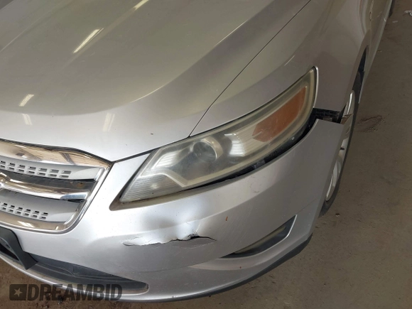 2011 Ford Taurus SEL with VIN 1FAHP2EW6BG170287, listed as a IAAI auction lot 42191702 with 199,477 mi miles. Bid and sale history available at carsss.com. Image 6.