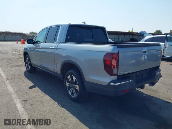 2019 Honda Ridgeline RTL-E with VIN 5FPYK3F79KB029771, listed as a IAAI auction lot 42448369 with 90,142 mi miles and . Bid and sale history available at DreamBid. Image 3.