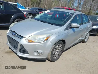 2012 Ford Focus SE with VIN 1FAHP3F29CL377721, listed as a IAAI auction lot 41848786 with 147,709 mi miles. Bid and sale history available at carsss.com. Image 2.