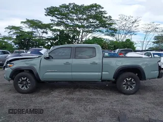 2023 Toyota Tacoma SR5 z VIN 3TYDZ5BNXPT024914, wystawiony jako IAAI lot #41302756 z przebiegiem 20 307 mil mil oraz . Historia ofert i sprzedaży dostępna na DreamBid. Obrazek 15.