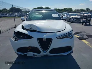 2018 Alfa Romeo Stelvio Ti Sport z VIN ZASFAKNN3J7B95471, wystawiony jako IAAI lot #42320127 z przebiegiem 77 138 mil mil oraz . Historia ofert i sprzedaży dostępna na DreamBid. Obrazek 12.