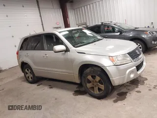 2012 Suzuki Grand Vitara Premium z VIN JS3TD0D62C4100440, wystawiony jako IAAI lot #41711815 z przebiegiem 171 527 mil mil oraz . Historia ofert i sprzedaży dostępna na DreamBid. Obrazek 13.
