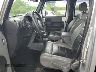 2010 Jeep Wrangler Unlimited Rubicon with VIN 1J4BA6H18AL222429, listed as a Copart auction lot 58348815 with 80,317 mi miles and Salvage title. Bid and sale history available at DreamBid. Image 7.